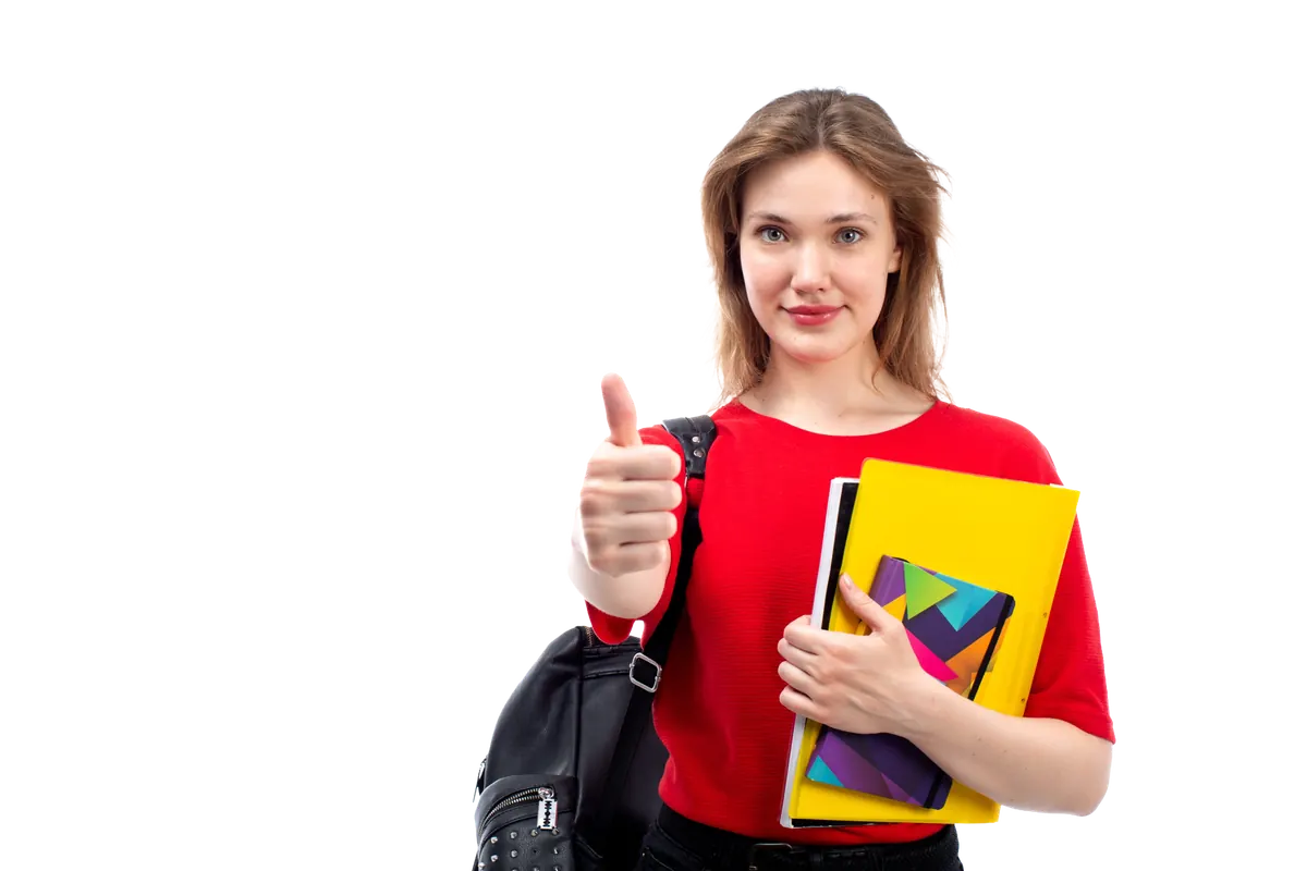 Student holding notebooks and giving a thumbs-up